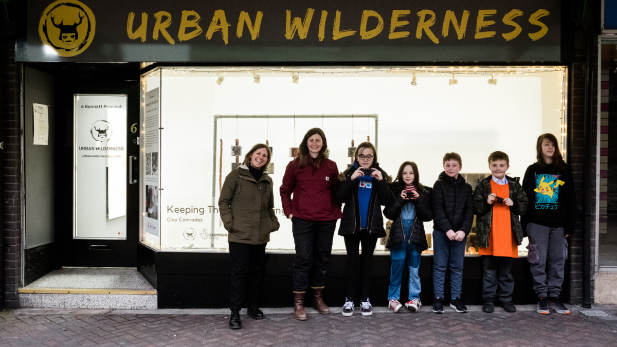 Group of people standing outside Urban Wilderness Office