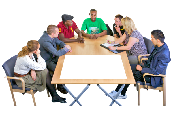 People sitting around a table in a meeting.