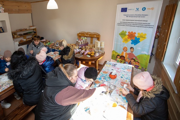 Children painting at the festival