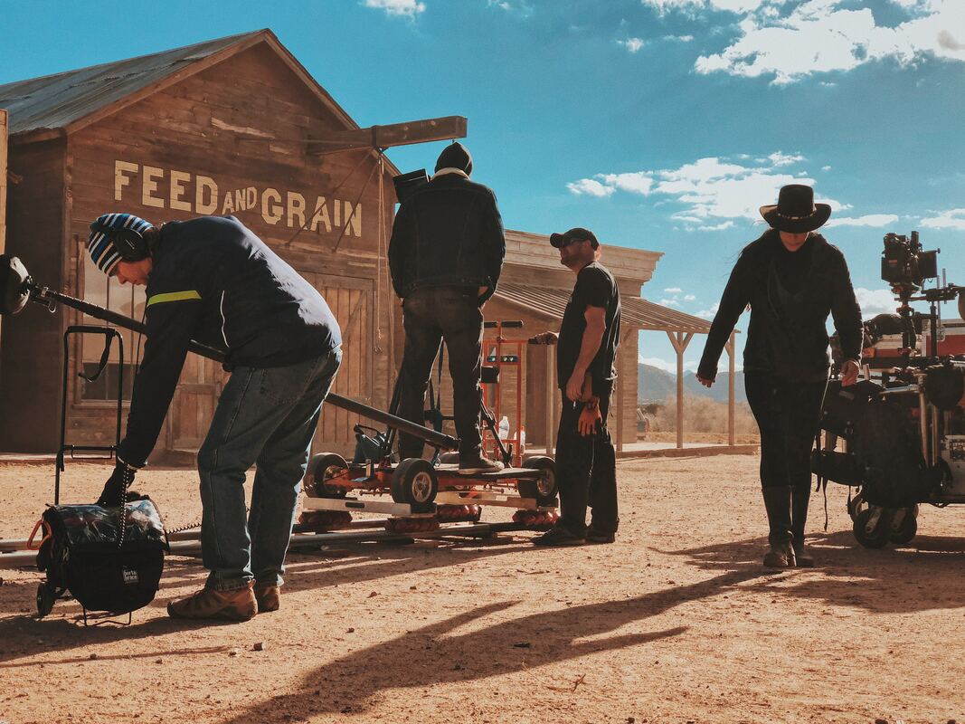 Film crew on shoot in the desert