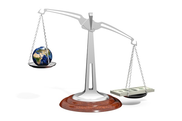 money and the world on a scales