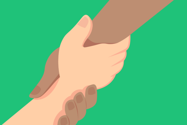 An image of two hands gripping each other by the wrist. One hand is Black, one is White.