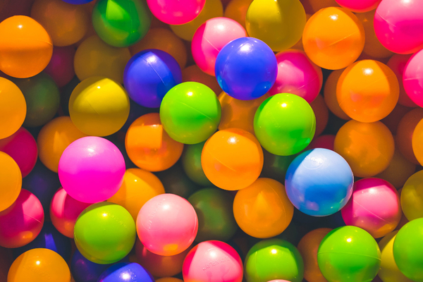 Close up on a pit of coloured balls