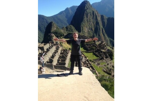 Tam standing in front of Machu Pichu
